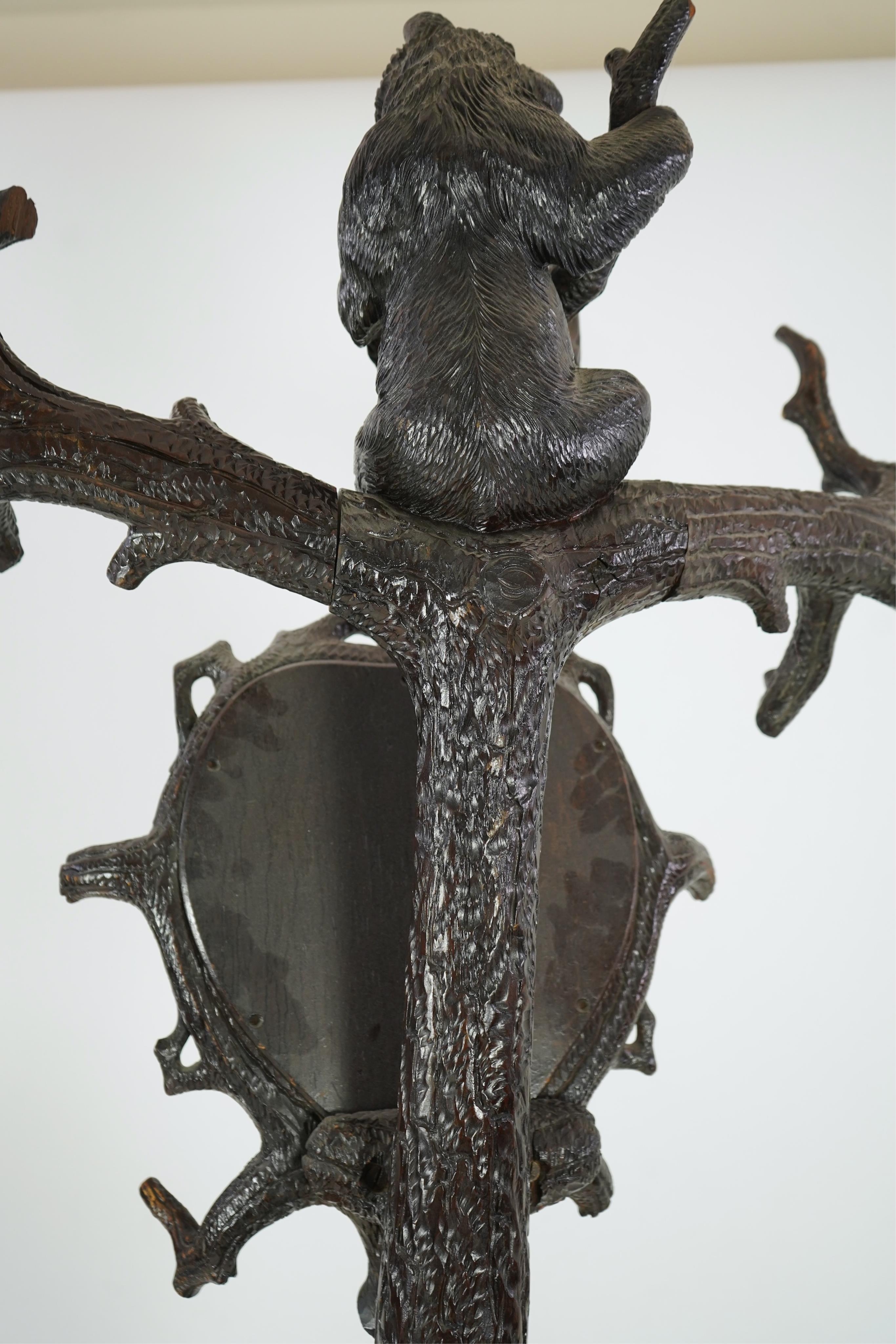 A late 19th century Black forest carved bear hallstand